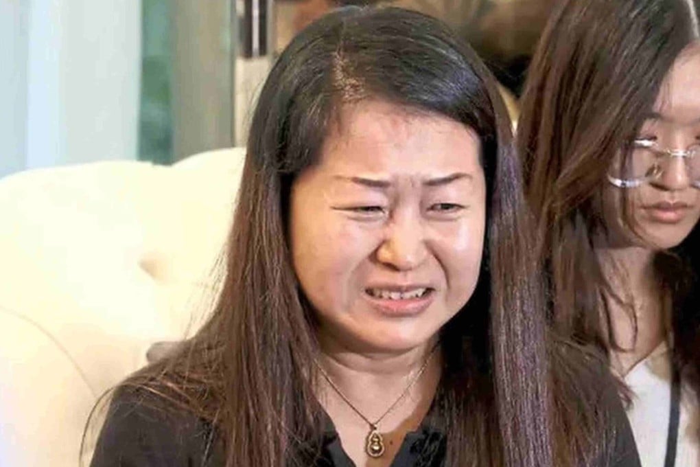 Wong Lee Ping (left) is overcome with emotion when speaking at her daughter’s wake in Kuala Lumpur earlier this month. Photo: The Star