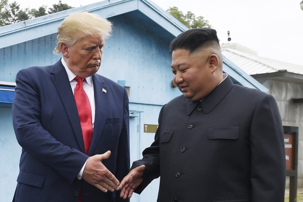 US President Donald Trump (left) and North Korean leader Kim Jong-un shake hands during their third meeting in Panmunjom on June 30, 2019. Photo: AP