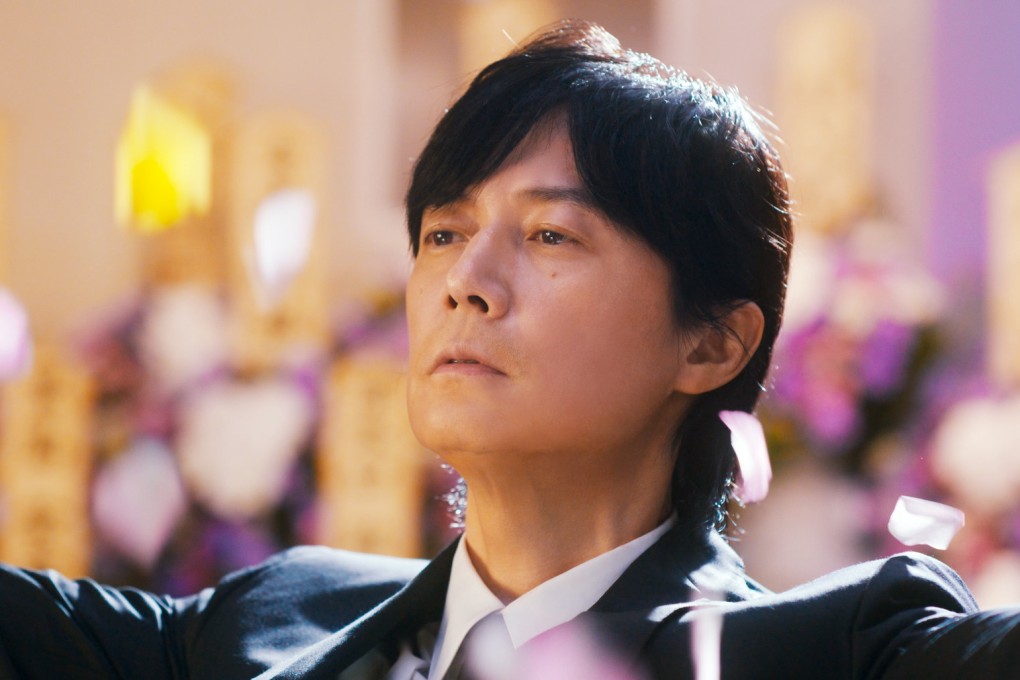 Masaharu Fukuyama in a still from Black Showman (category: IIA, Japanese), co-starring Kasumi Arimura and directed by Ryo Tanaka.