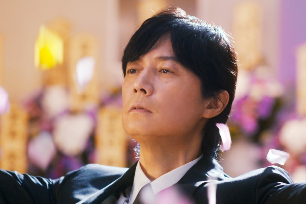 Masaharu Fukuyama in a still from Black Showman (category: IIA, Japanese), co-starring Kasumi Arimura and directed by Ryo Tanaka.