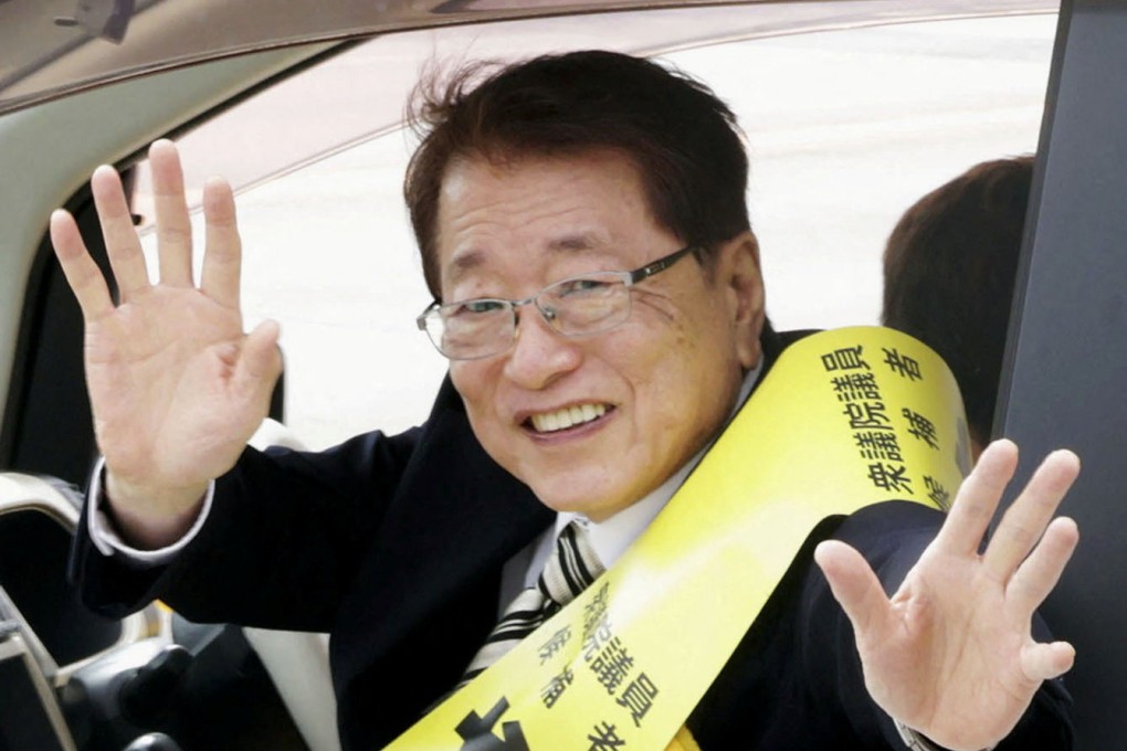 Taku Yamamoto, the husband of Japan’s new Prime Minister Sanae Takaichi and a former member of the LDP, waves from a car during a campaign in Sabae, Fukui Prefecture, earlier this month. Photo: Kyodo/Reuters