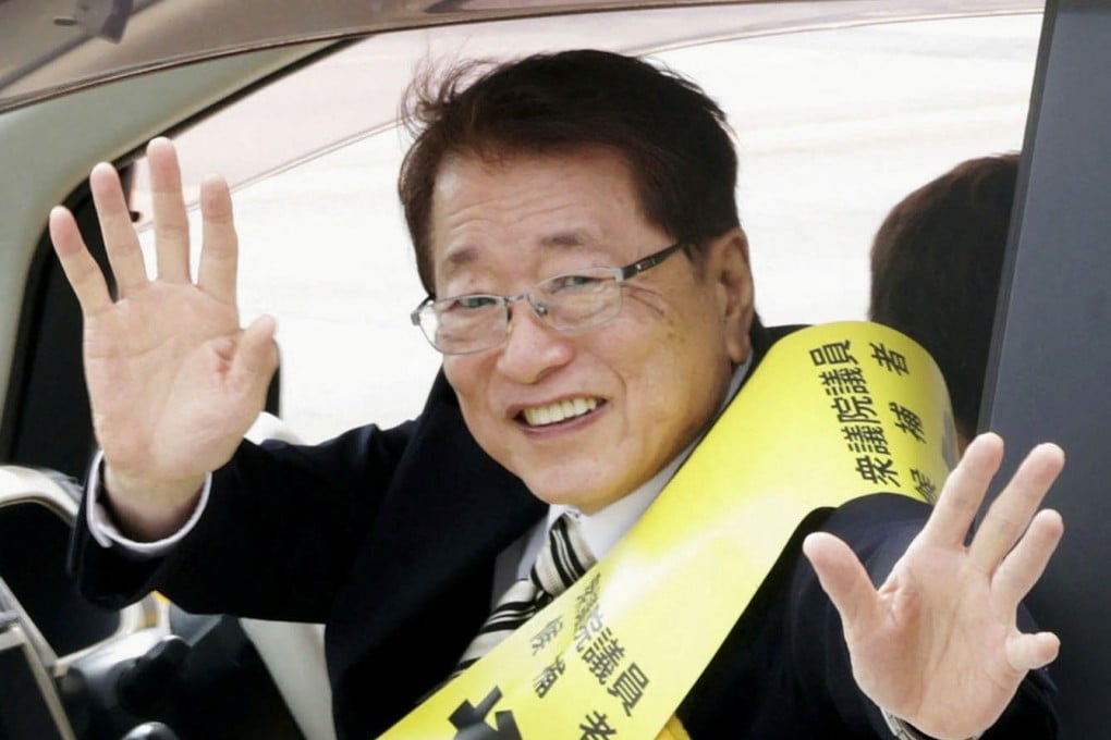 Taku Yamamoto, the husband of Japan’s new Prime Minister Sanae Takaichi and a former member of the LDP, waves from a car during a campaign in Sabae, Fukui Prefecture, earlier this month. Photo: Kyodo/Reuters