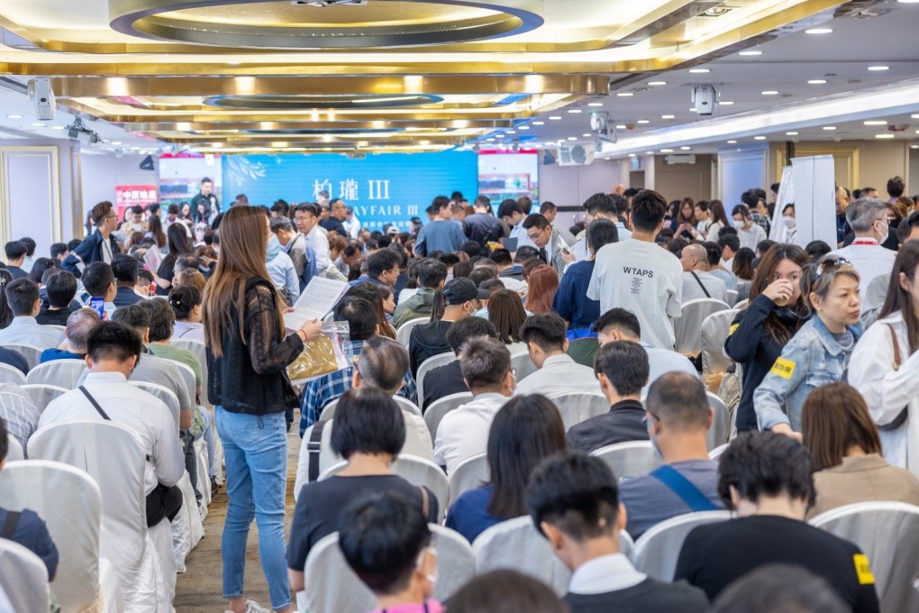 Potential buyers wait to buy flats in the Grand Mayfair III residential development in Yuen Long on Monday. Photo: Handout