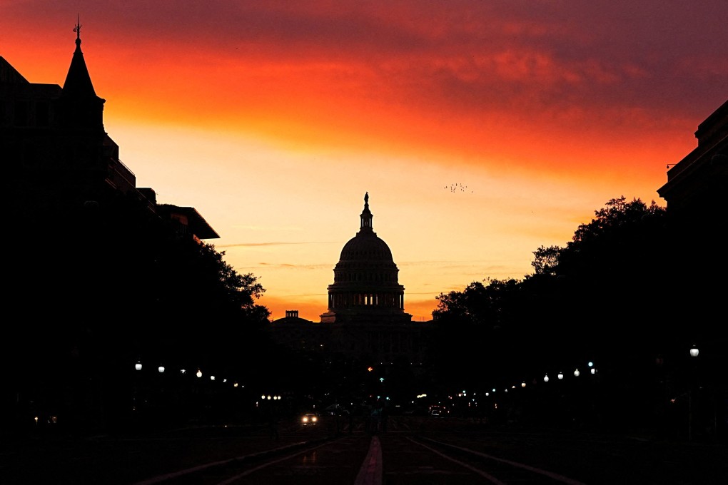 The sun rises behind the Capitol Building in Washington, weeks into the continuing US government shutdown. Photo: Reuters