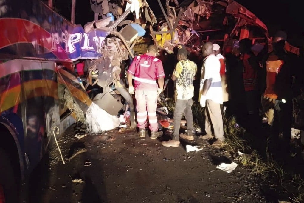 People gather at the scene of a multiple vehicle collision in northern Uganda on Wednesday. Photo: AP