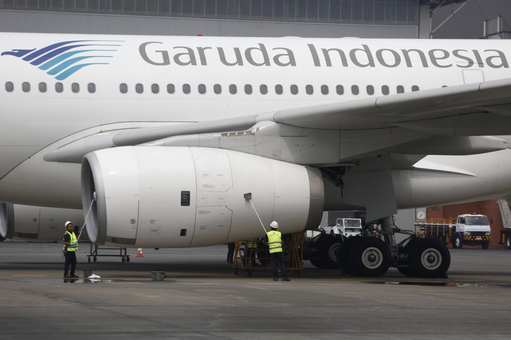 A Garuda Indonesia plane undergoing maintenance in Tangerang, Indonesia. The airline has appointed a Singaporean as chief financial officer and a Briton as director of transformation. Photo: AP
