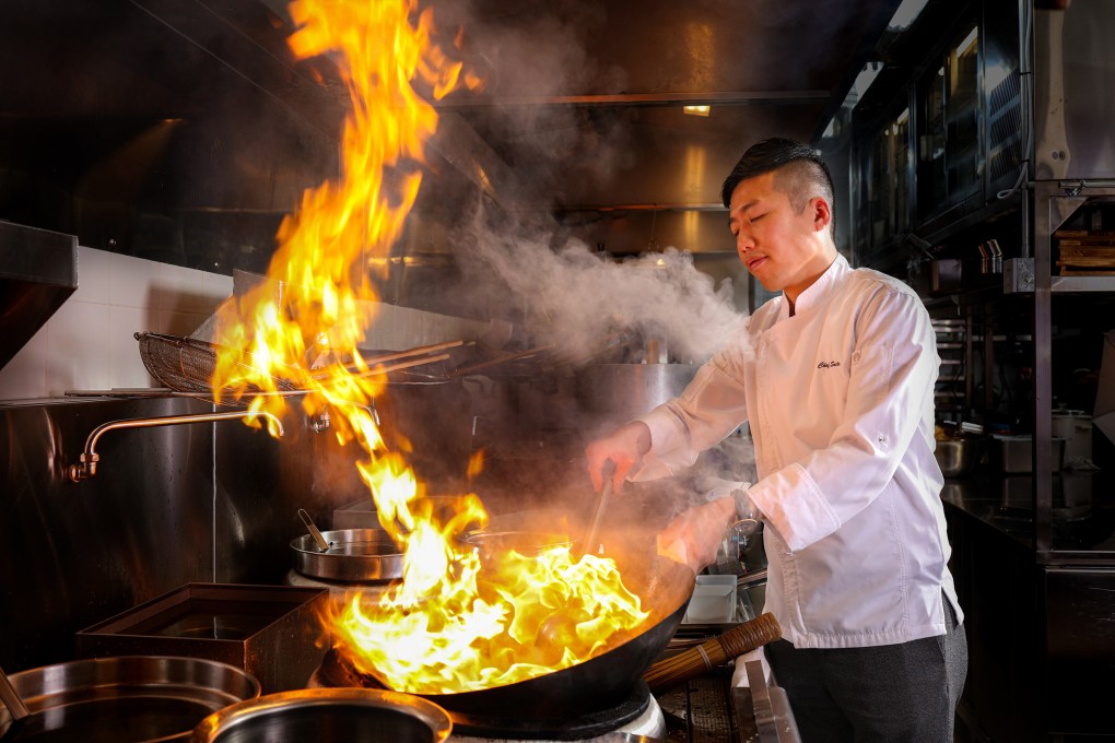 Chef Saito Chau, culinary director of Chinesology in Hong Kong, demonstrates classic Cantonese cooking skills with a wok. He is a fan of high-end Chinese food, and Japanese and Spanish dishes. Photo: Miramar Group