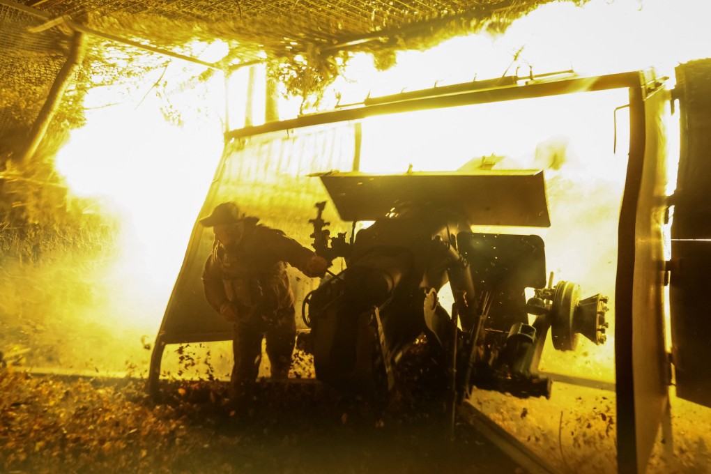A Ukrainian artilleryman fires a howitzer towards Russian troops near the town of Kupiansk in the Kharkiv region on Friday. Photo: Reuters