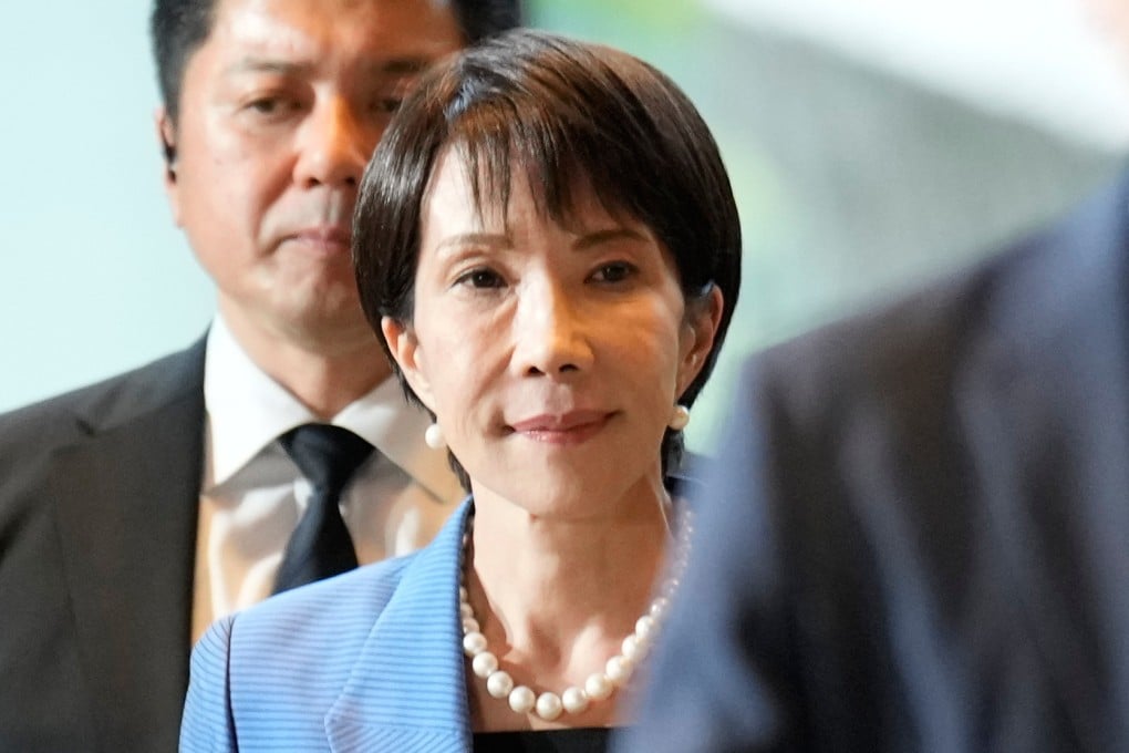 Japan’s newly elected Prime Minister Sanae Takaichi arrives at her official workplace in Tokyo on Tuesday. Photo: AP