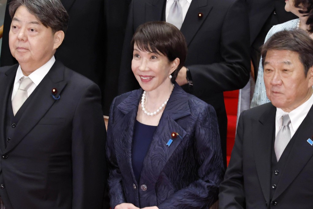 Japan’s new Prime Minister Sanae Takaichi (centre) poses for a group photo at her office in Tokyo with her cabinet following its first meeting on Tuesday. Photo: Kyodo