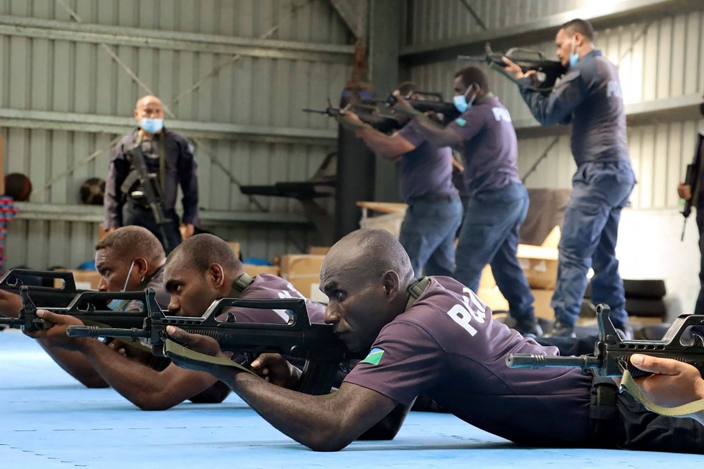 Royal Solomon Islands Police Force officers train with a Chinese police liaison team in 2022. Photo: RSIPF/AFP
