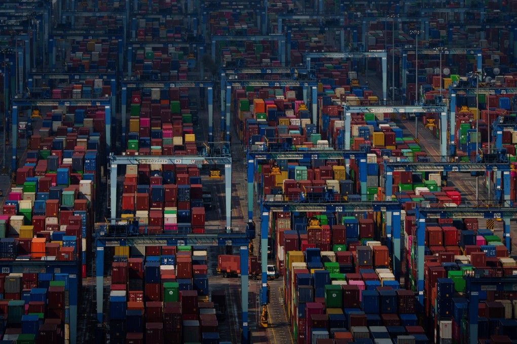 Shipping containers are stacked at Port Klang in Malaysia. Photo: AP