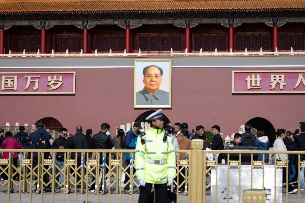 A police officer stands guard at Tiananmen Square in Beijing. File photo: EPA
