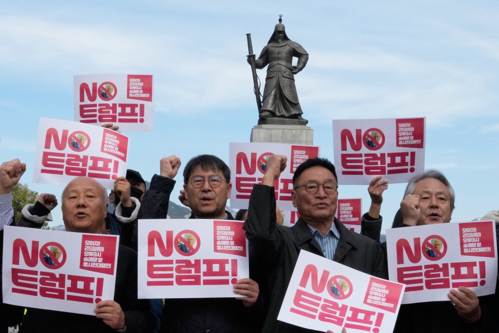 South Korean protesters attend a rally against US President Donald Trump’s tariffs policy on South Korea, near the US embassy in Seoul on Tuesday. The signs read “No Trump”. Photo: AP