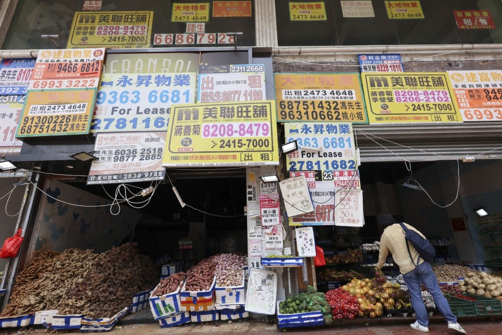 Leasing advertisements compete for attention along a row of shops in Yuen Long on July 2. Photo: Jelly Tse