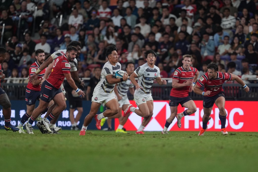 Japan centre Yuto Mori races clear of the Hong Kong defence on the way to scoring one of his side’s nine tries. Photo: Elson Li