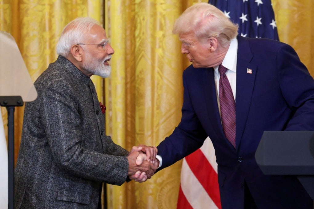 US President Donald Trump (right) and Indian Prime Minister Narendra Modi shake hands as they attend a joint press conference at the White House on February 13, 2025. Photo: Reuters