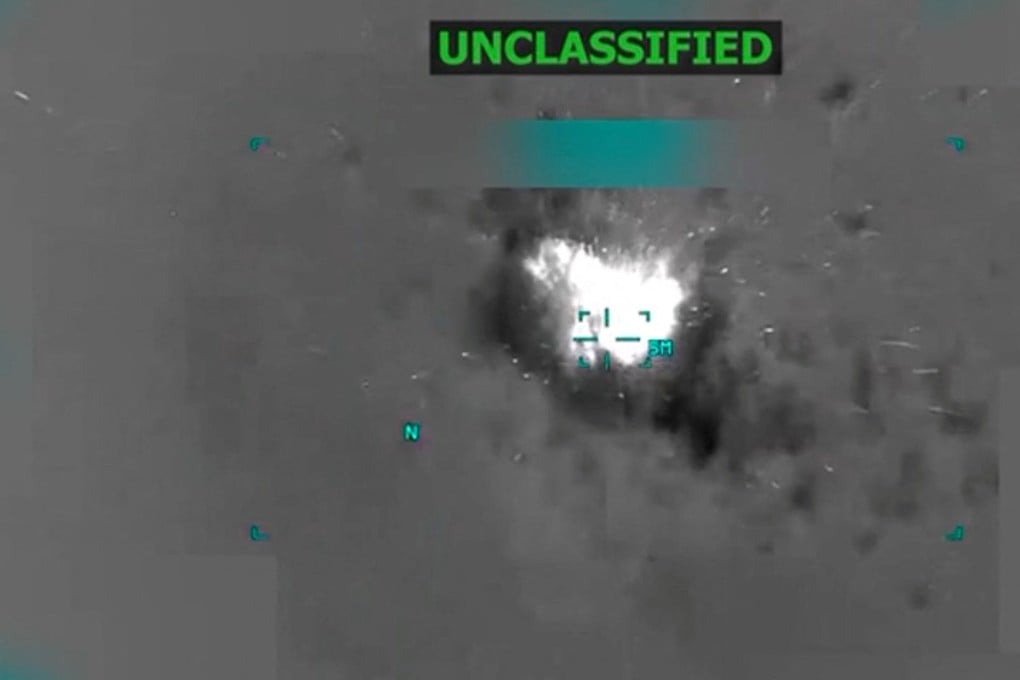 A boat burns off the coast of Venezuela in this screen grab taken from a video released on October 14, depicting what the US said was a strike - one of several, before and since - on suspected drug-traffickers. Photo: via Reuters