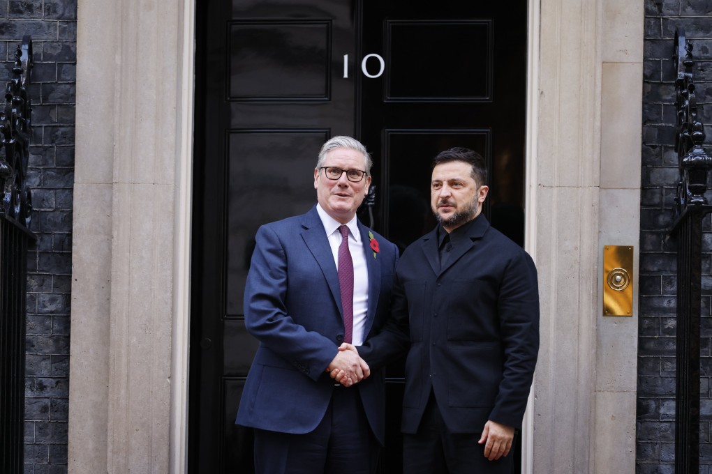 Ukraine’s President Volodymyr Zelensky is greeted by British Prime Minister Keir Starmer at Downing Street in London on Friday. Photo: EPA