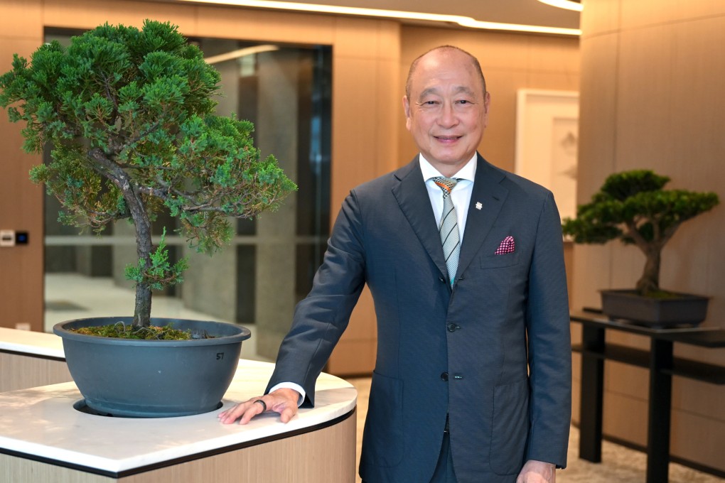 UOB CEO Wee Ee Cheong with ones of his beloved bonsai trees. Photo: David Wirawan