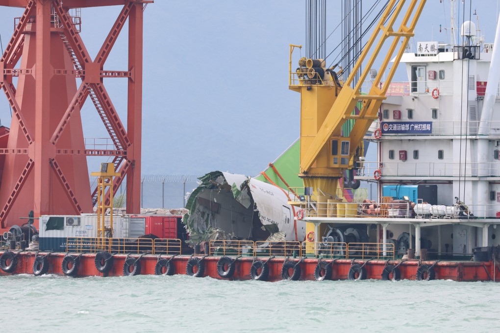 The black boxes from the crashed cargo plane that killed two security workers have been recovered after the aircraft’s tail was lifted from the sea. Photo: Edmond So