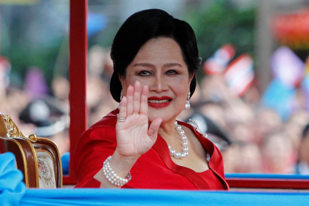 Thailand’s Queen Sirikit waves to people during her arrival in Chinatown for Lunar New Year celebrations in Bangkok in January 2012. Photo: Reuters