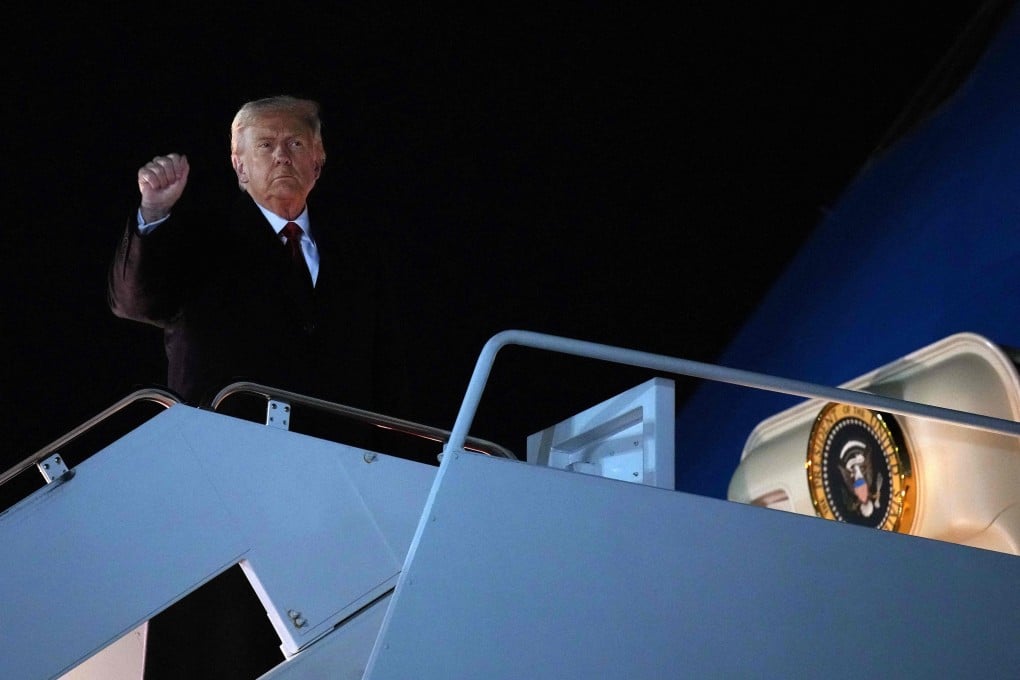 US President Donald Trump boards Air Force One on Friday at Joint Base Andrews, Maryland as he travels to Malaysia for the Asean summit and other meetings. Photo: Getty Images via AFP