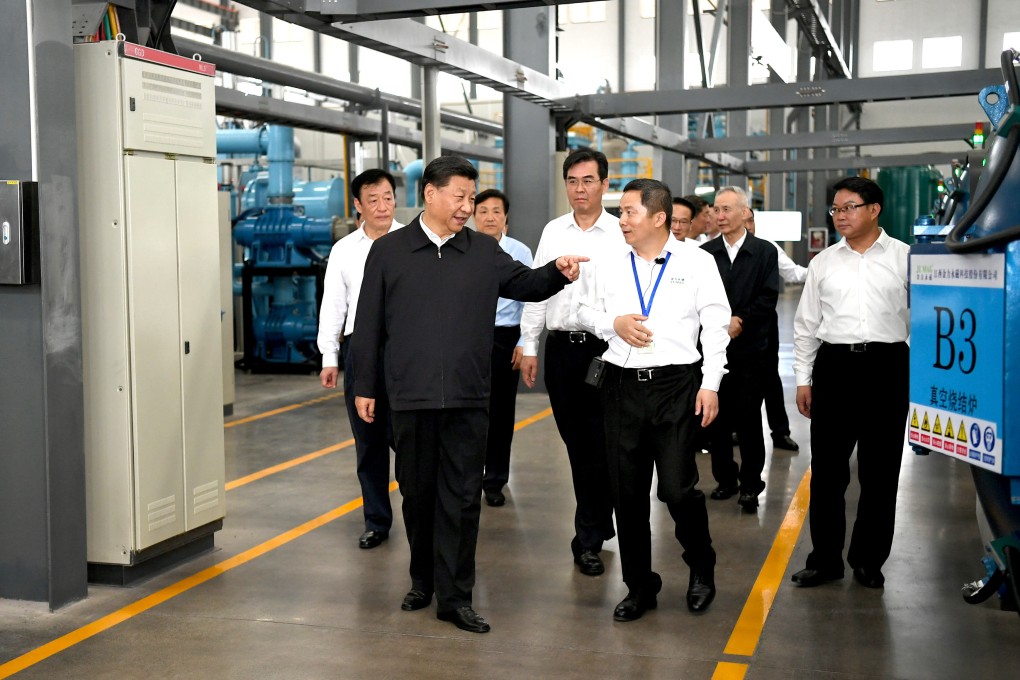 President Xi Jinping learns about the rare earth production process at a facility in Ganzhou, Jiangxi province on May 20, 2019. Photo: Xinhua