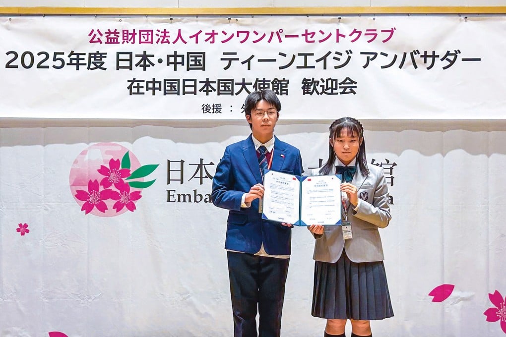 Two of the “teenage ambassadors” attend a reception at the Japanese embassy in Beijing. Photo: Laura Zhou