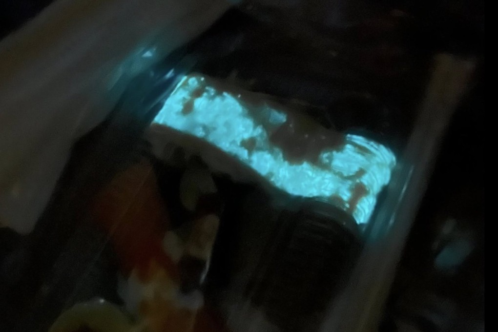 A tray of sushi pieces bought by a Thai woman including an egg sushi piece that glows with a blue light in the dark. Photo: Facebook/Mild Burusskorn