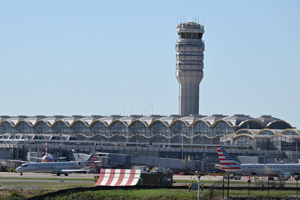 The control tower at Ronald Reagan Washington National Airport in Arlington, Virginia. Travellers will face flight cancellations in the coming weeks as the government shutdown worsens the air-traffic controller staffing crunch. Photo: AFP