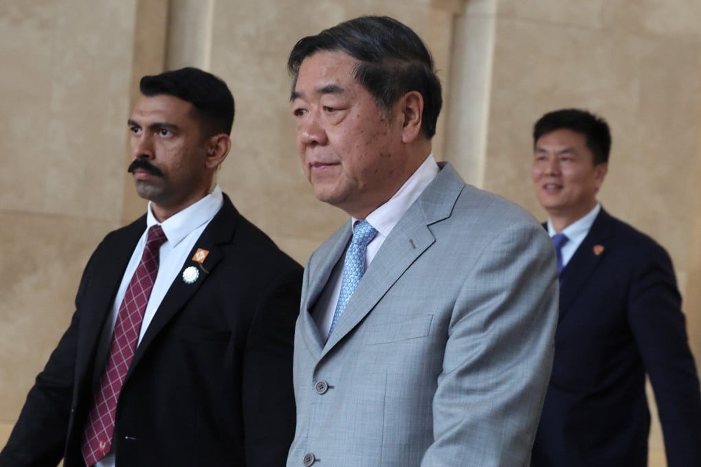 Chinese Vice-Premier He Lifeng leaves a hotel during a round of US-China trade talks in Kuala Lumpur, Malaysia. Photo: EPA