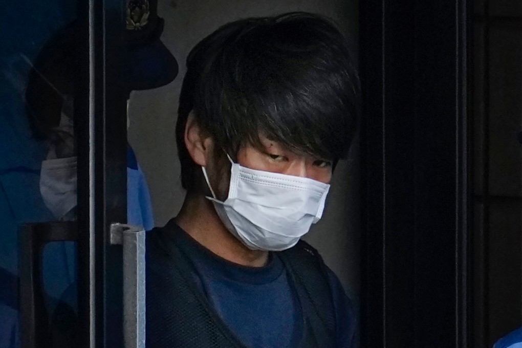 Tetsuya Yamagami is escorted to the prosecutors’ office in  Nara on July 10, 2022. Photo: Kyodo/AP