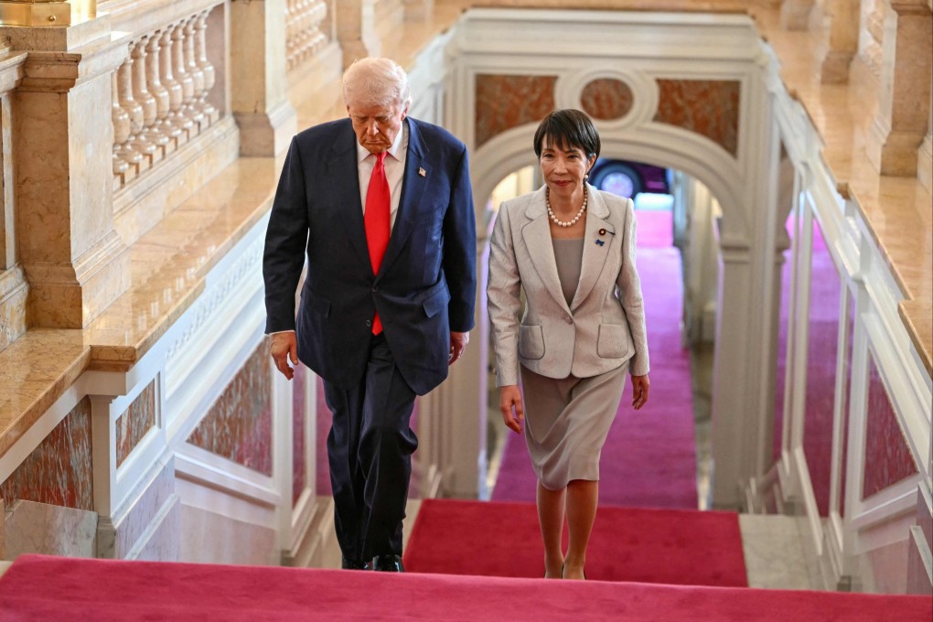 Japan’s Prime Minister Sanae Takaichi (right) walks with US President Donald Trump at the Akasaka State Guest House in Tokyo on Tuesday. Photo: AFP