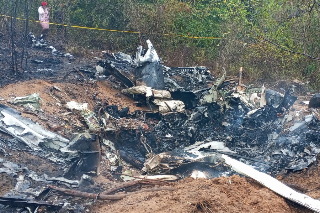 Smoke rises from the wreckage of a plane crash in Kwale County, Kenya, on Tuesday. Photo: EPA