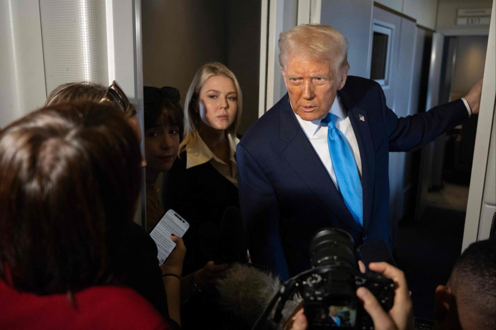 US President Donald Trump aboard Air Force One while travelling from Japan to South Korea on Wednesday. Photo: AFP