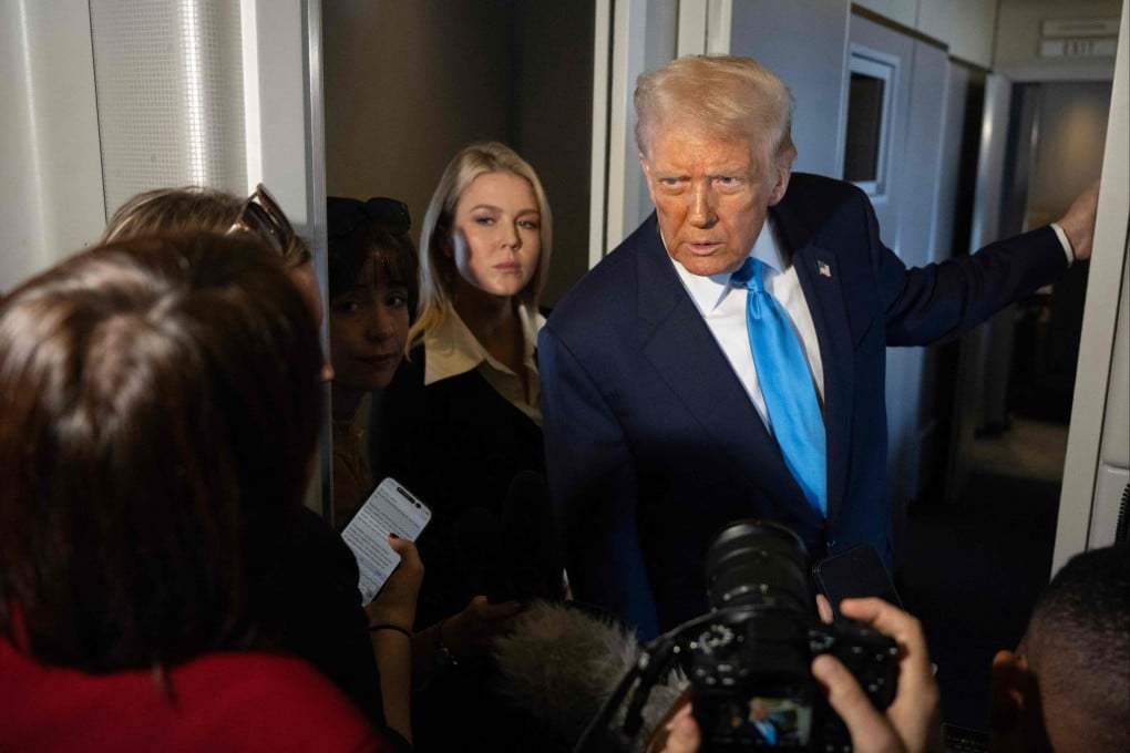 US President Donald Trump aboard Air Force One while travelling from Japan to South Korea on Wednesday. Photo: AFP