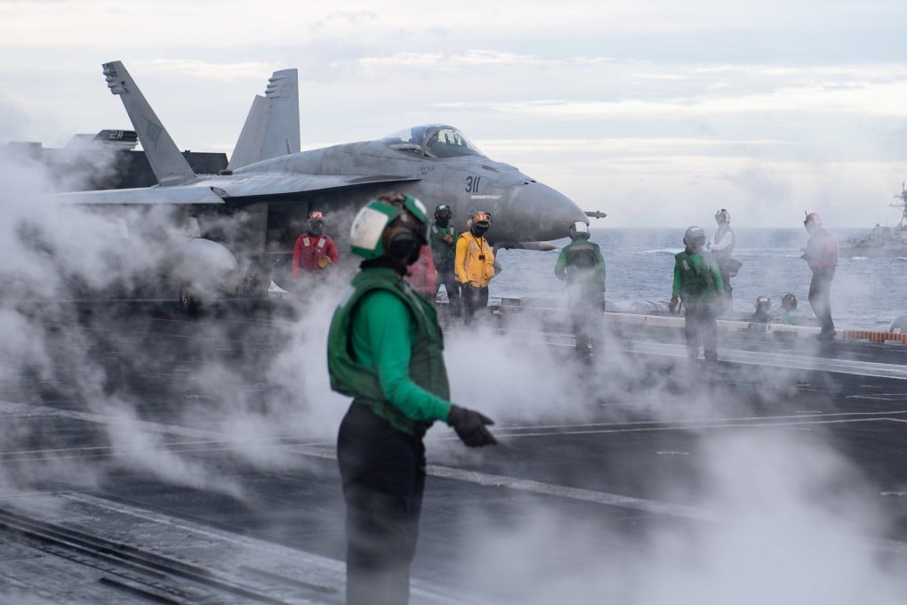 President Donald Trump called for a return to steam-powered launch systems on aircraft carriers, telling sailors that “I love the sight of that beautiful steam pouring off that deck”. Photo: US Navy