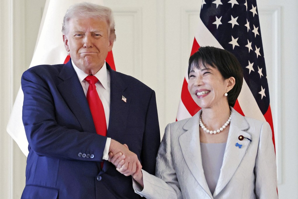 Japanese Prime Minister Sanae Takaichi (right) and US President Donald Trump shake hands ahead of their summit in Tokyo on Tuesday. Photo: Kyodo