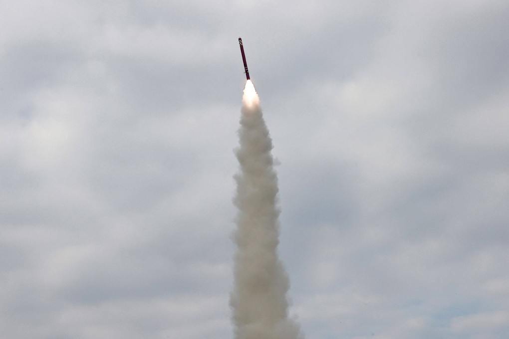 A sea-to-surface strategic cruise missile, that analysts say is likely a “Fire Arrow 3-31”, is seen being test launched on Tuesday in this picture released by North Korean state media. Photo: KCNA/KNS/AFP