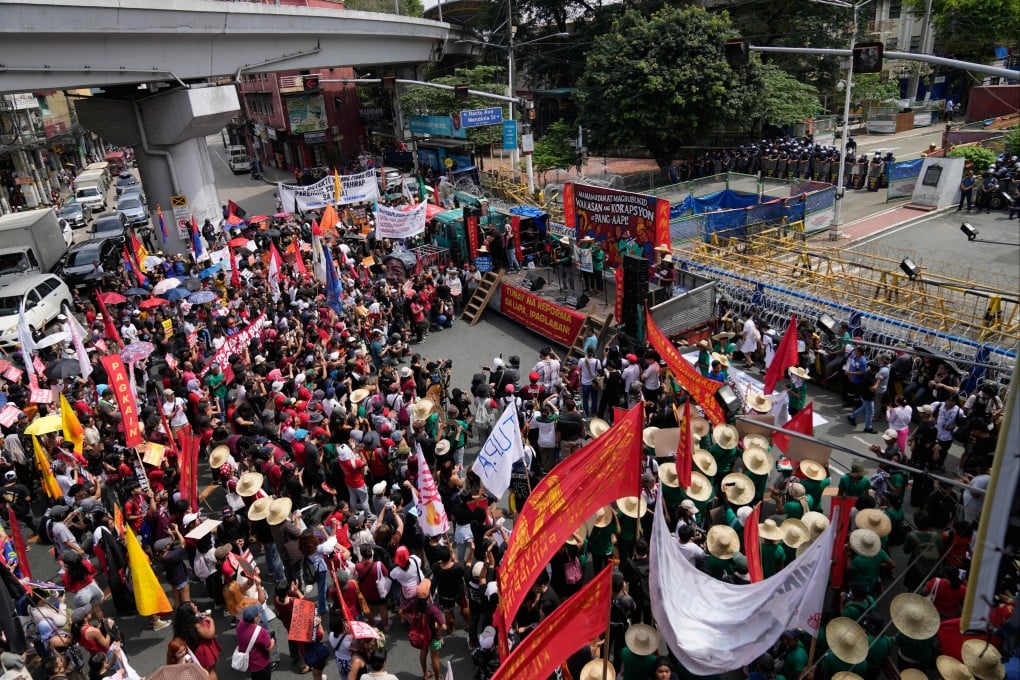 Protesters gather during an anti-corruption rally on October 21 near the Malacanang presidential palace in Manila, the Philippines. Photo: AP
