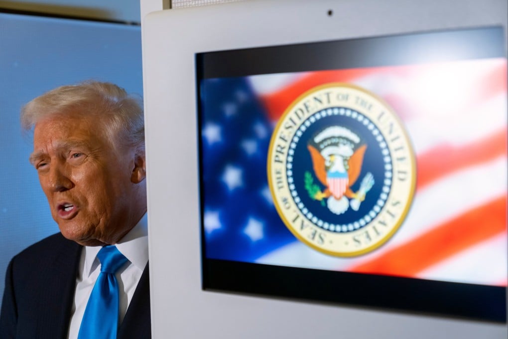 US President Donald Trump speaks to reporters aboard Air Force One on Wednesday. Photo: AP