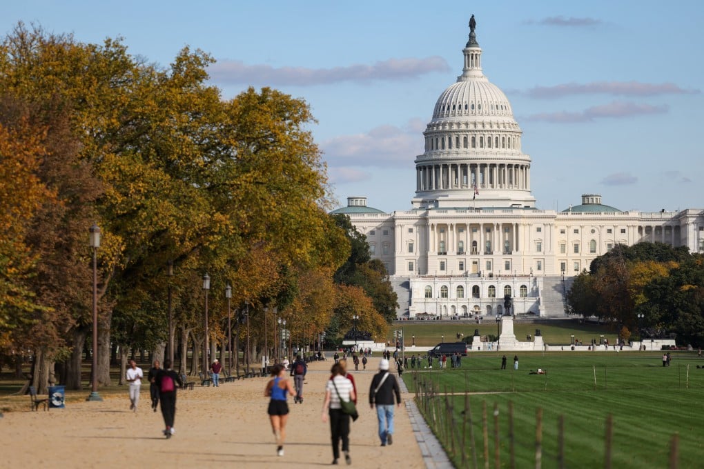 People walk along the National Mall near the US Capitol building on Monday. Photo: Reuters