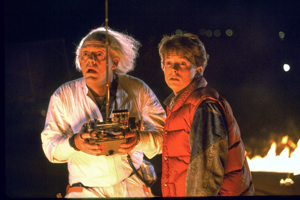 Michael J. Fox and Christopher Lloyd in a still from Back to the Future (1985). Fox reflects on the landmark sci-fi film as it turns 40 years old. Photo: Universal Pictures via AP