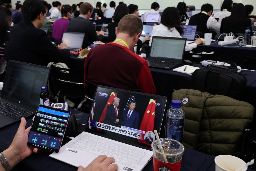 A broadcast of the meeting between Xi Jinping and Donald Trump in South Korea. Photo: REUTERS