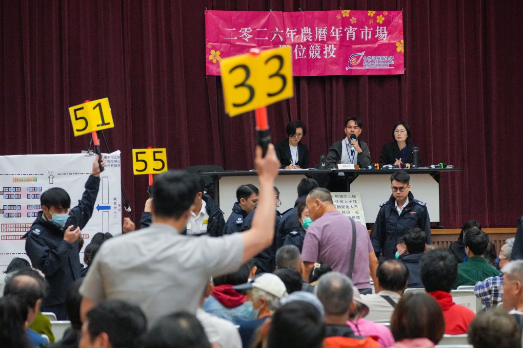 Bidders vie for Lunar New Year fair stalls at the government office in Lai Chi Kok. Photo: May Tse
