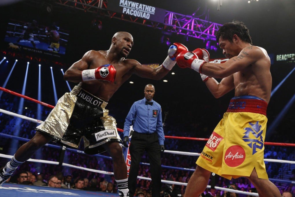 American Floyd Mayweather (left) beat Manny Pacquiao when they fought in a welterweight unification bout in Las Vegas in May 2015. Photo: AFP