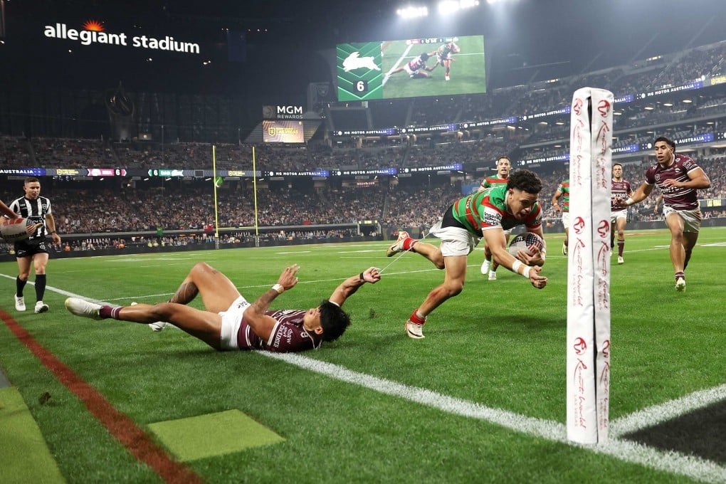 South Sydney Rabbitohs’ Jacob Gagai breaks the tackle of Sea Eagles’ Jaxson Paulo on his way to score a try during a game at Allegiant Stadium in Las Vegas. Photo: Getty Images