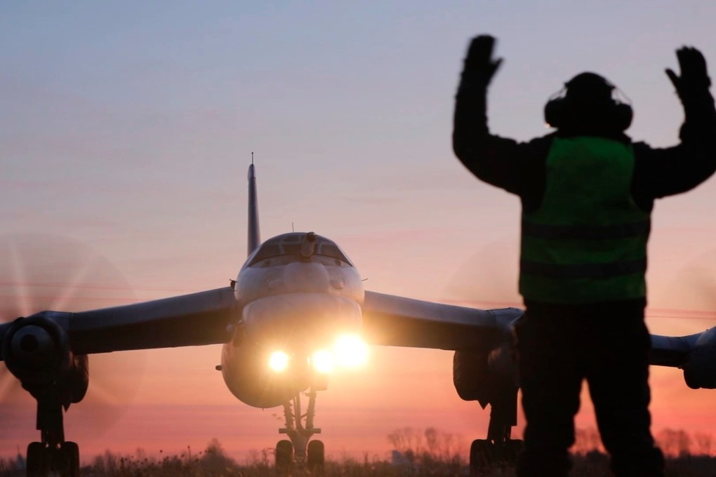 A Tu-95 bomber taxis to take off for a planned flight over the Sea of ​​Japan in a still from a video distributed on Friday. Photo: Russian Defence Ministry Press Service/AP