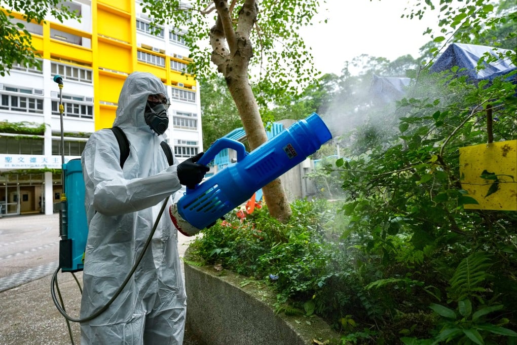 Mosquito control work is carried out near the location of the first patient’s home in Diamond Hill. Photo: Karma Lo